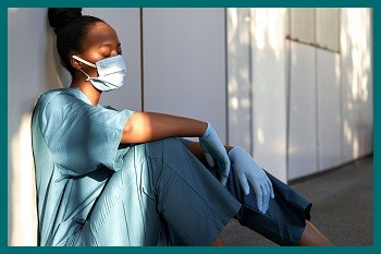 a female nurse with compassion fatigue