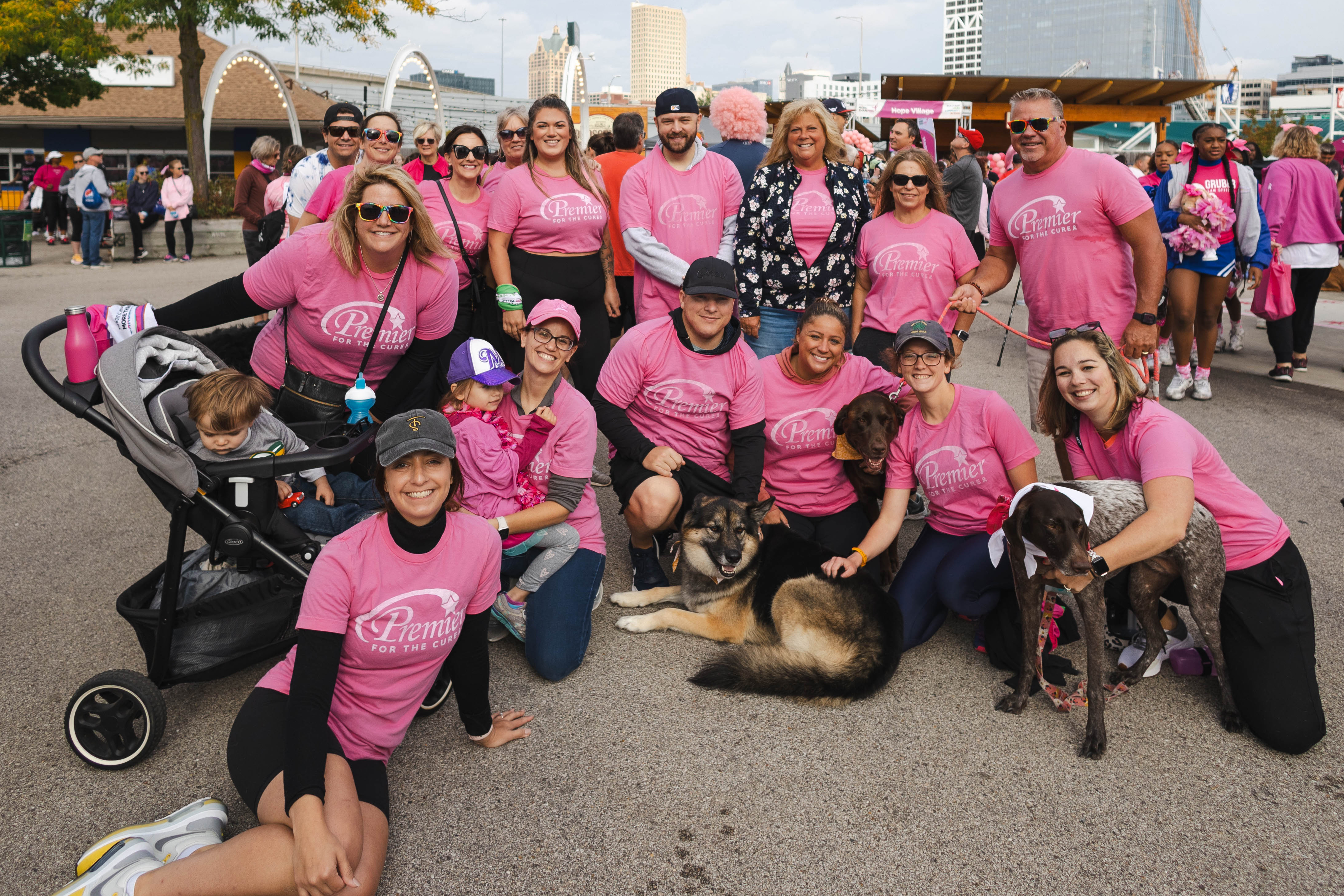 corporate team posing for group photo at the annual Susan G Komen walk